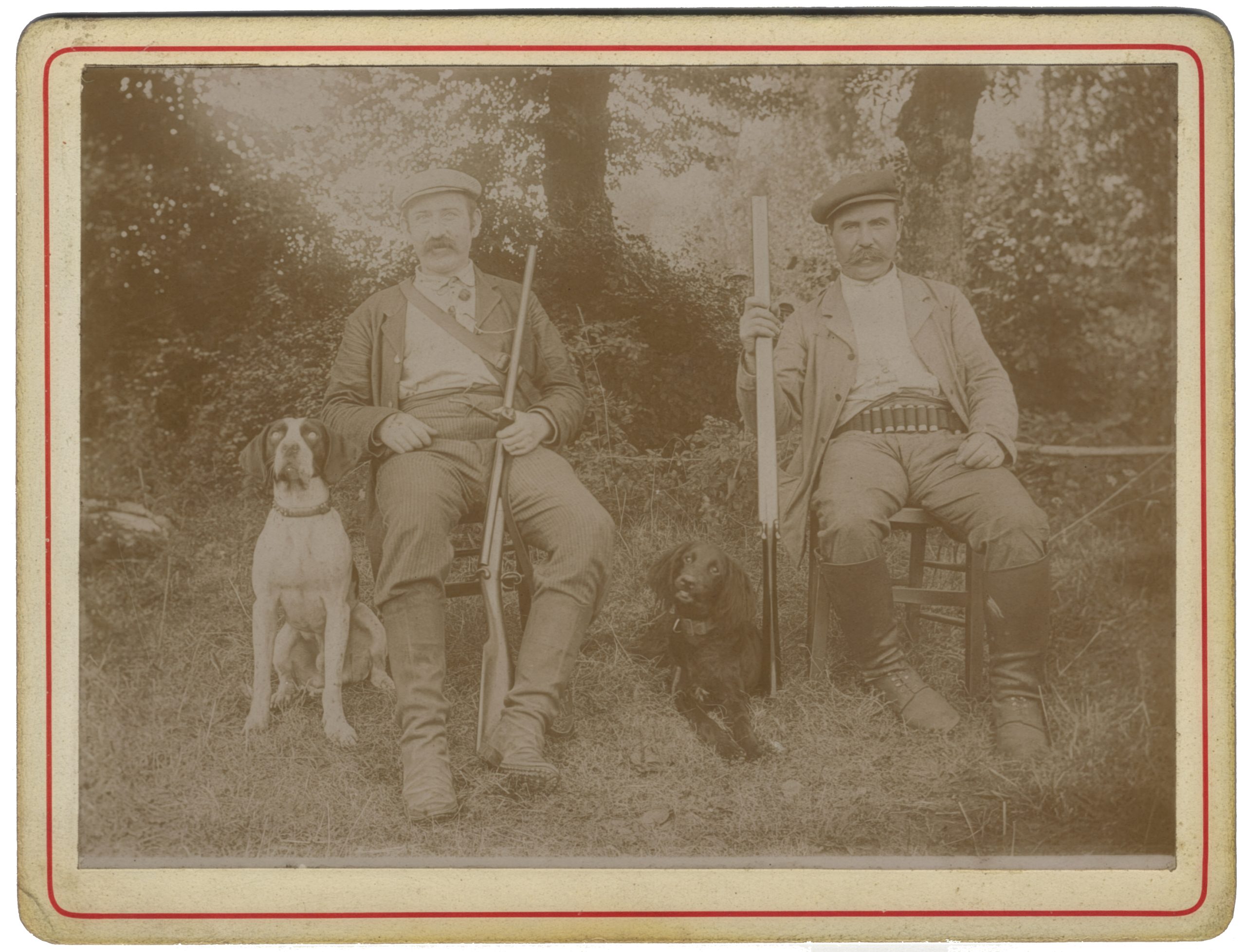 Hunters at Rest: Companions with Their Dogs in the Field
