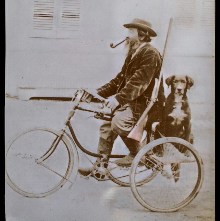 The Tricycle Hunter: Sportsman and Dog in Transit